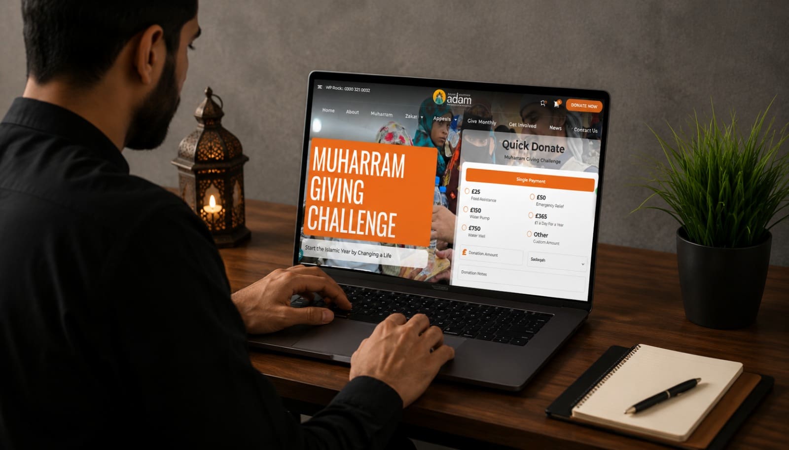 How to Donate Water Pump in Muharram Online Safely 3 In the image "how-to-donate-water-pump-in-muharram-online-safely.jpeg", a person sits at a wooden desk typing on a laptop that displays the Children of Adam charity website page for the "Muharram Giving Challenge." The screen shows online donation options for causes like food assistance, water pumps, and water wells, with a traditional lantern and a notebook placed on the desk nearby.